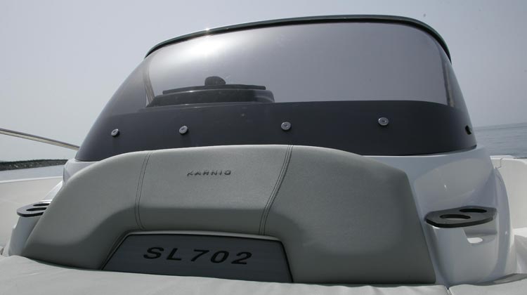 Styled console with double curvature windscreen and oval stainless steel rail